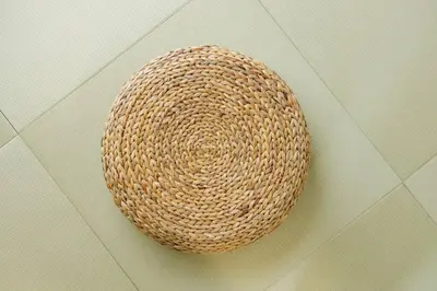 a large straw basket sitting on a floor at NEGAU House in Tokyo