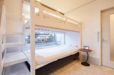 a bedroom with a bunk bed with a window at Touch and Go Azumabashi - Vacation STAY 85085 in Tokyo