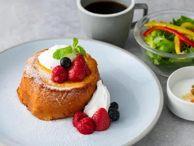 a piece of cake with berries on a white plate at sequence SUIDOBASHI - Tokyo in Tokyo