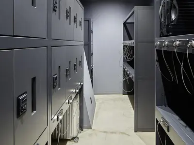 a laundry room with black cabinets and a hallway at sequence SUIDOBASHI - Tokyo in Tokyo