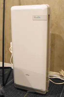 a white refrigerator sitting on top of a floor at REGALO Shibaura - Vacation STAY 88351 in Tokyo