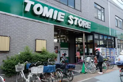 a store with bikes parked outside of a store at The Light Inn Tokyo in Tokyo