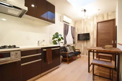 a kitchen with a sink and a table in a room at Hikifune Kodate - Vacation STAY 8861 in Tokyo