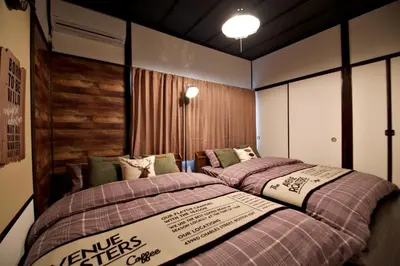 two beds in a small room with two at Horikiri 3-chome detached house - Vacation STAY 8849 in Tokyo