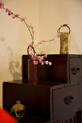 a table with a vase with flowers on it at Mukojima Kodate - Vacation STAY 8857 in Tokyo