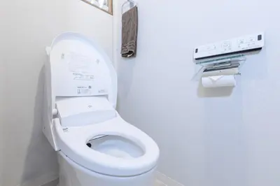 a bathroom with a white toilet with the lid up at Horikiri Kodate - Vacation STAY 8860 in Tokyo