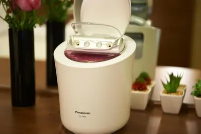 a white blender sitting on top of a table at Sotetsu Fresa Inn Kanda-Otemachi in Tokyo