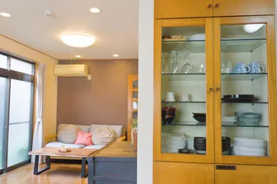 two views of a living room and a dining room at Ikebukuro in Tokyo