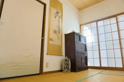 a room with a large door and a room with at Ikebukuro in Tokyo