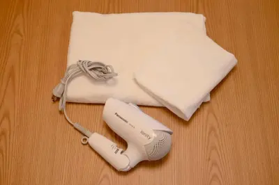 a wii remote sitting on top of a table at T-home1 1F in Tokyo