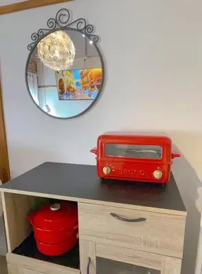 a table with a red toaster on it with a mirror at 2 type room, Akira&chacha guest home杉並区世田谷direct to shinjuku for 13 min 上北沢3分 近涉谷新宿Suitable for three or more people in Tokyo