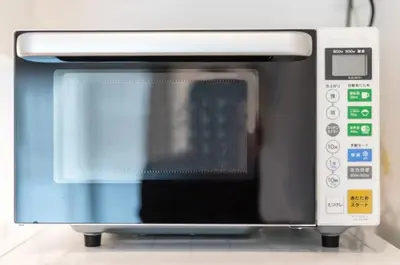 a microwave oven sitting on top of a counter at Salon Shibuya - Vacation STAY 78188 in Tokyo