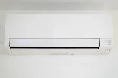 a computer monitor sitting on top of a wall at Salon Shibuya - Vacation STAY 78183 in Tokyo