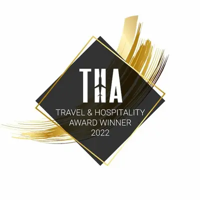 a black and gold logo for a travel and hospitality award winner at TK Court Ojima - Vacation STAY 91237 in Tokyo