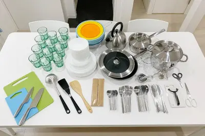 a table with kitchen utensils on top of it at Sunstay - Shinbamba 1 in Tokyo
