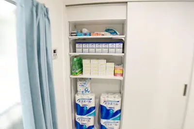a refrigerator filled with lots of milk at Sunstay - Shinbamba 1 in Tokyo
