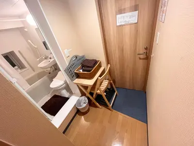 a small bathroom with a sink and a toilet at Hotel EL Shinjuku 6 in Tokyo