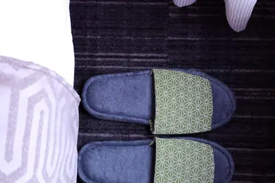 a close up of three different colored ties at KOKO HOTEL Ginza-1chome in Tokyo