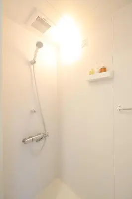 a bathroom with a shower with a glass door at Katsushika-ku - House - Vacation STAY 92154 in Tokyo