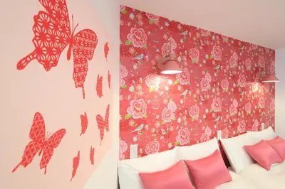 a bedroom with a wall with butterflies and flowers at Katsushika-ku - House - Vacation STAY 92154 in Tokyo