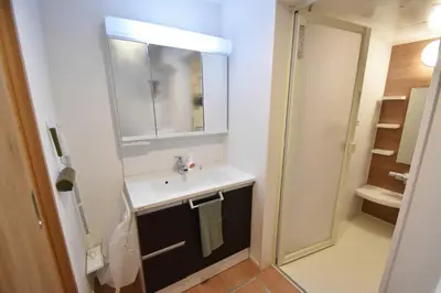 a bathroom with a sink and a mirror at Higashi-Mukojima 2-chome Kodate - Vacation STAY 8987 in Tokyo