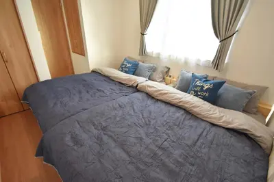 a large bed in a room with a window at Higashi-Mukojima 2-chome Kodate - Vacation STAY 8987 in Tokyo