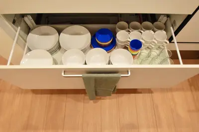 a drawer filled with cups and plates and a towel at Higashi-Mukojima 2-chome Kodate - Vacation STAY 8987 in Tokyo