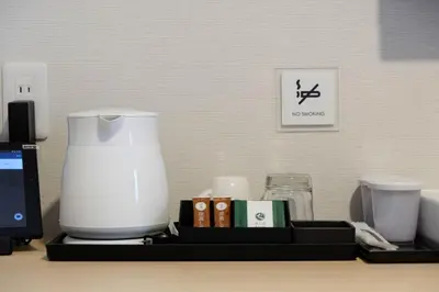 a counter with a blender and other items on it at The Light Inn - Vacation STAY 94702 in Tokyo