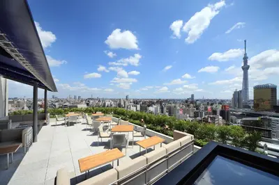 a view of the city from the roof of a building at The Gate Hotel Kaminarimon by Hulic in Tokyo