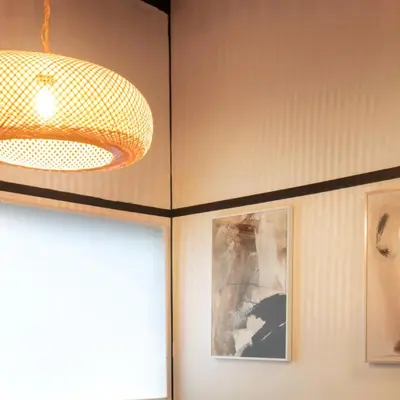 a chandelier hanging in a room with a picture at Close to Shinjuku! 3BR House for 10, Kids Welcome, High-Speed Wi-Fi in Tokyo