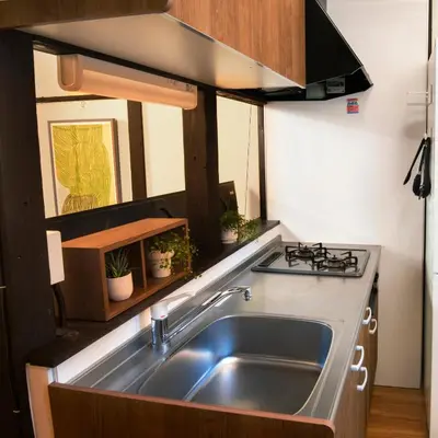 a kitchen with a sink and a stove at Close to Shinjuku! 3BR House for 10, Kids Welcome, High-Speed Wi-Fi in Tokyo