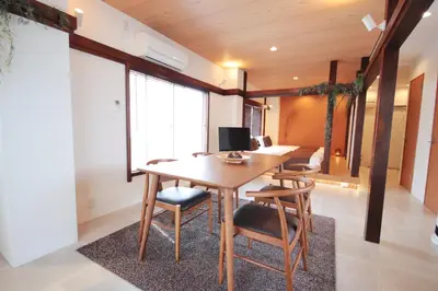 an office with a wooden table and chairs at TOGOSHI 568 STAY Togoshi Ginza in Tokyo