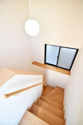 a small staircase in a house with a window at \u62bc\u4e0a\u30cf\u30a6\u30b9 in Tokyo
