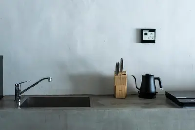 a kitchen counter with a sink and a blender at Shibuya Park Residence Yoyogi Park in Tokyo