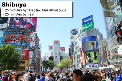 a crowd of people walking down a busy city street at MONday Apart Premium AKIHABARA ASAKUSABASHI Sta. in Tokyo