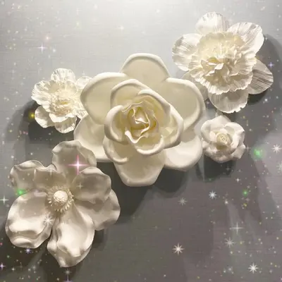 a group of white flowers on a table at LacQuer House ASAKUSAⅠ in Tokyo