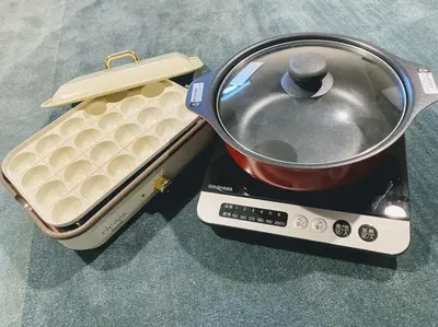 a pot sitting on top of a scale with a pan at LacQuer House ASAKUSA 2 in Tokyo