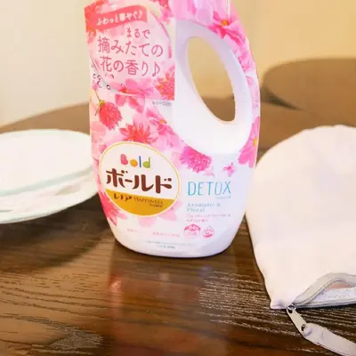 a bottle of deodorant sitting on top of a table at Japanese Modern House in Shinagawa in Tokyo