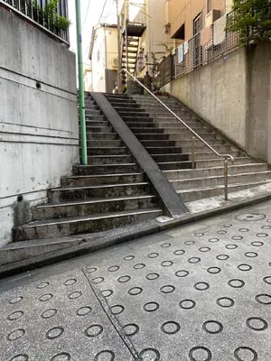 a set of stairs leading up to a building at Japanese Modern House in Shinagawa in Tokyo