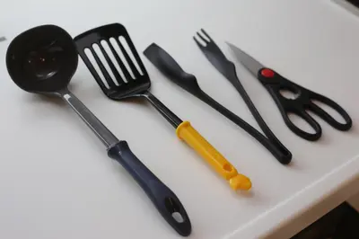 a group of utensils sitting on top of a table at Sumida Base in Tokyo