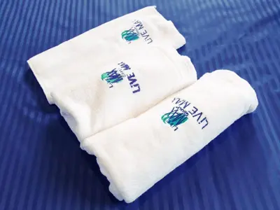 a pair of white socks with the words happy new year at HOTEL LiVEMAX Ikebukuro Ekimae in Tokyo