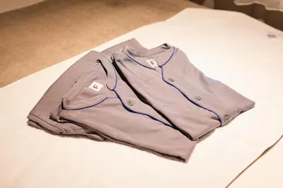 a shirt sitting on top of a table at HOTEL ASYL TOKYO KAMATA in Tokyo