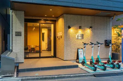 a group of scooters parked on the side of a building at winco - Vacation STAY 06660v in Tokyo