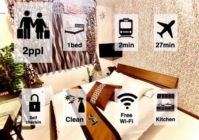 a room with a bed and signs on the wall at Eternity APARTMENT HOTEL Shinagawa - Vacation STAY 01949v in Tokyo