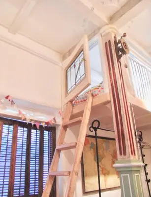 a bunk bed in a room with a ladder at TOKYO Ebisu! 2adults & 2kids Max4ppl FamilyOK! in Tokyo
