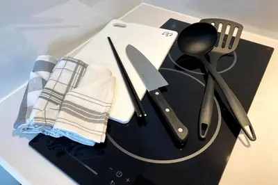 a bunch of utensils sitting on a table at Belle harmonie togoshi203 in Tokyo