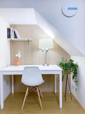 a white desk with a chair and a lamp at nestay villa tokyo takanawa in Tokyo