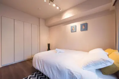 a bedroom with a large white bed in it at HIZ HOTEL - Vacation STAY 08966v in Tokyo