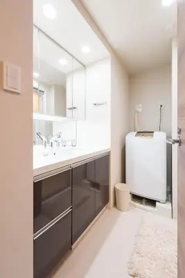 a bathroom with a sink and a large mirror at HIZ HOTEL - Vacation STAY 08955v in Tokyo