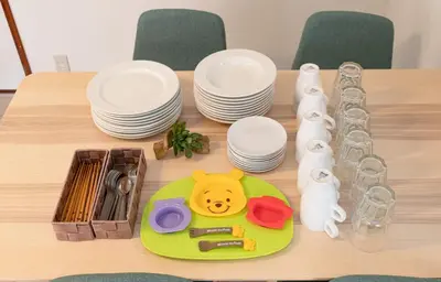 a table with a plate with a toy lion on it at Serendipity Koiwa - Vacation STAY 11031v in Tokyo